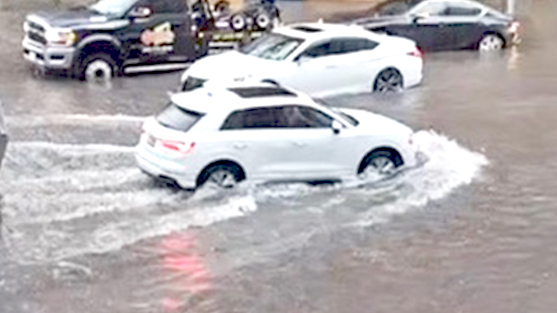 Fort Lauderdale flood on SE 3rd Avenue cars in high water