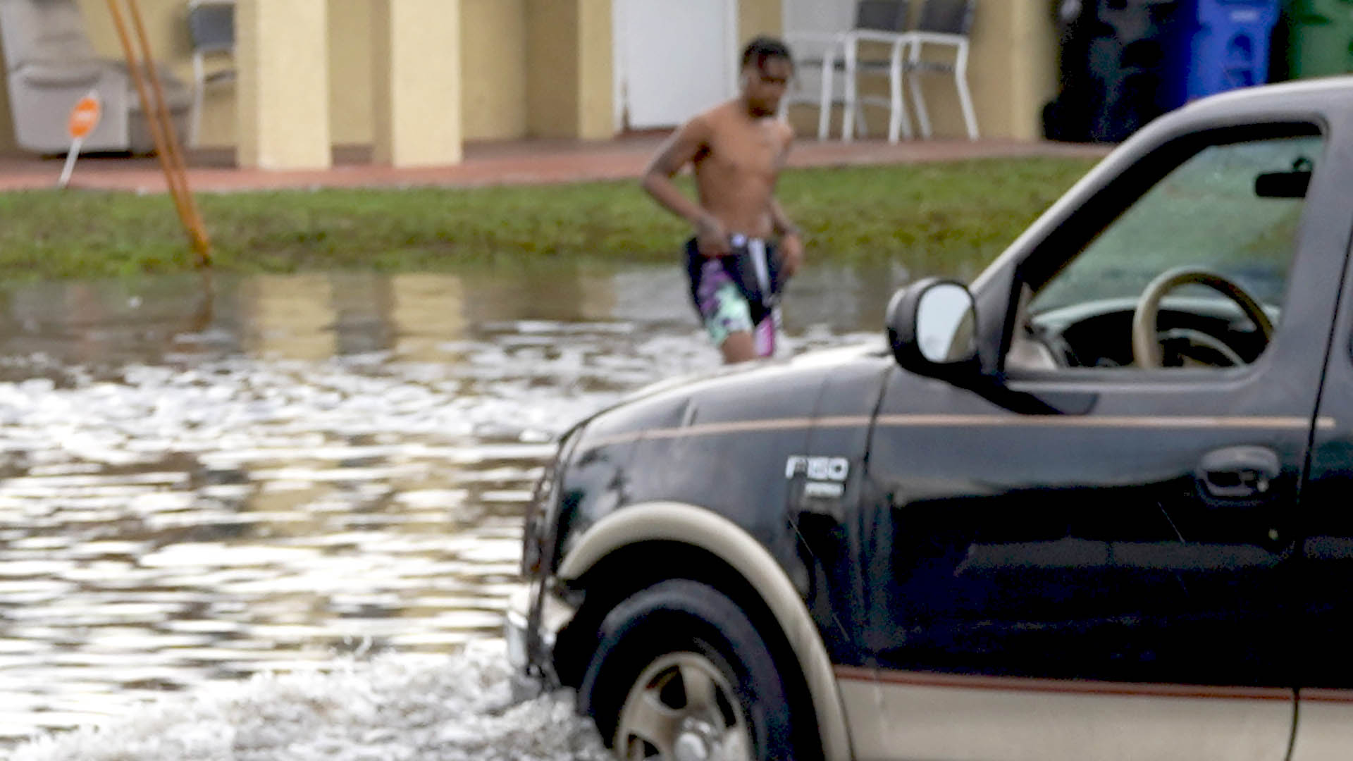 walking through flood water in Fort Lauderdale